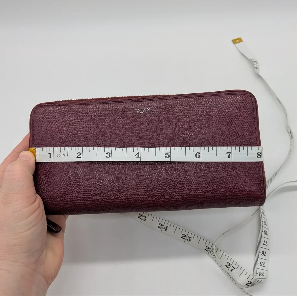 Tumi Plum Purple Leather Wallet